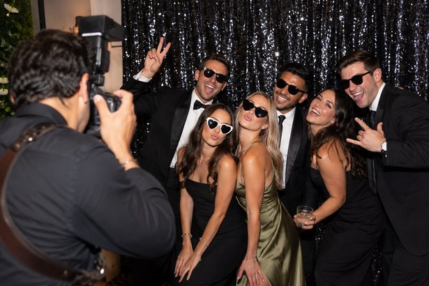 Photographer capturing candid guest moments