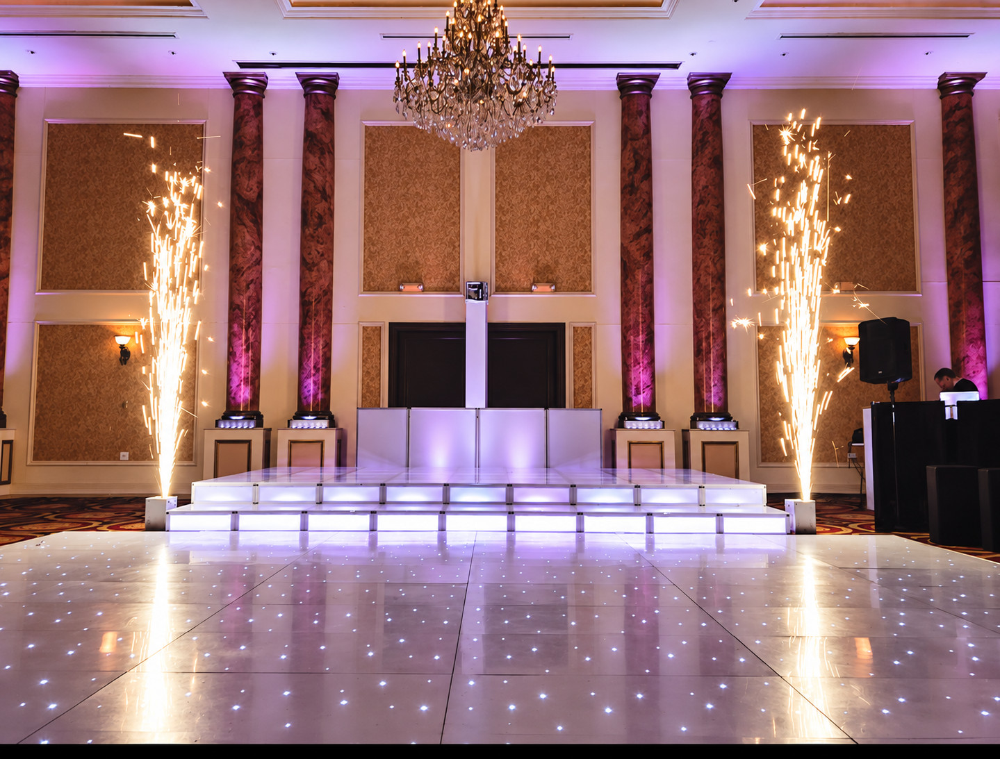 Wedding ballroom with a sparkling dance floor and cold spark effects