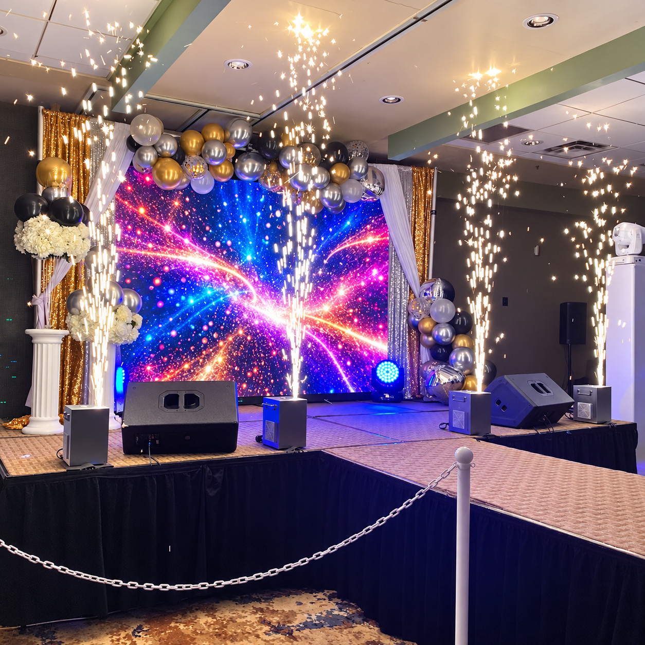 Celebration stage with cold sparks and an LED wall