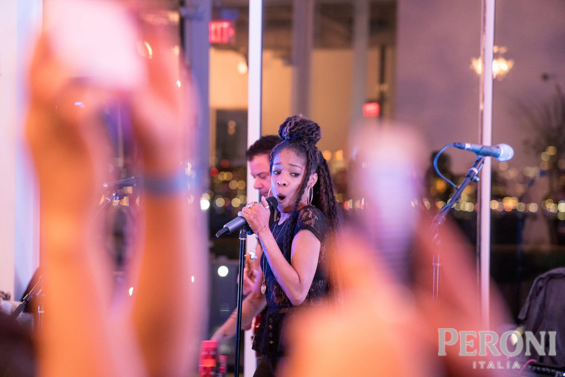 Singer performing for guests at an event