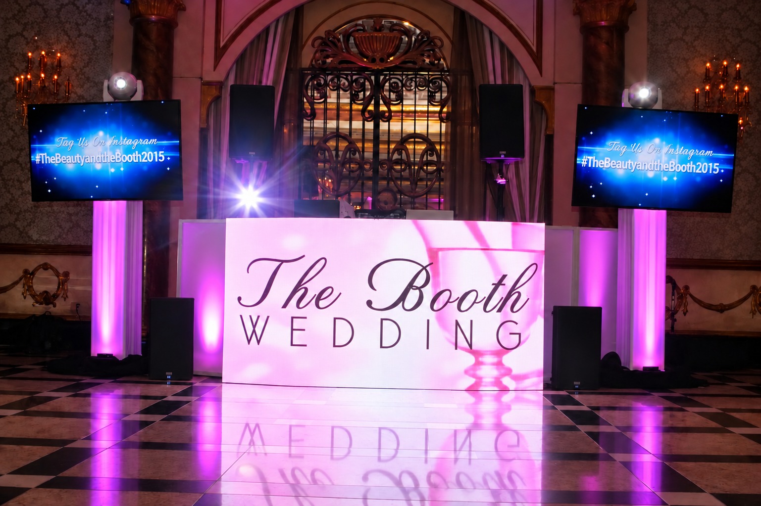 LED video wall and two event display screens at a wedding reception