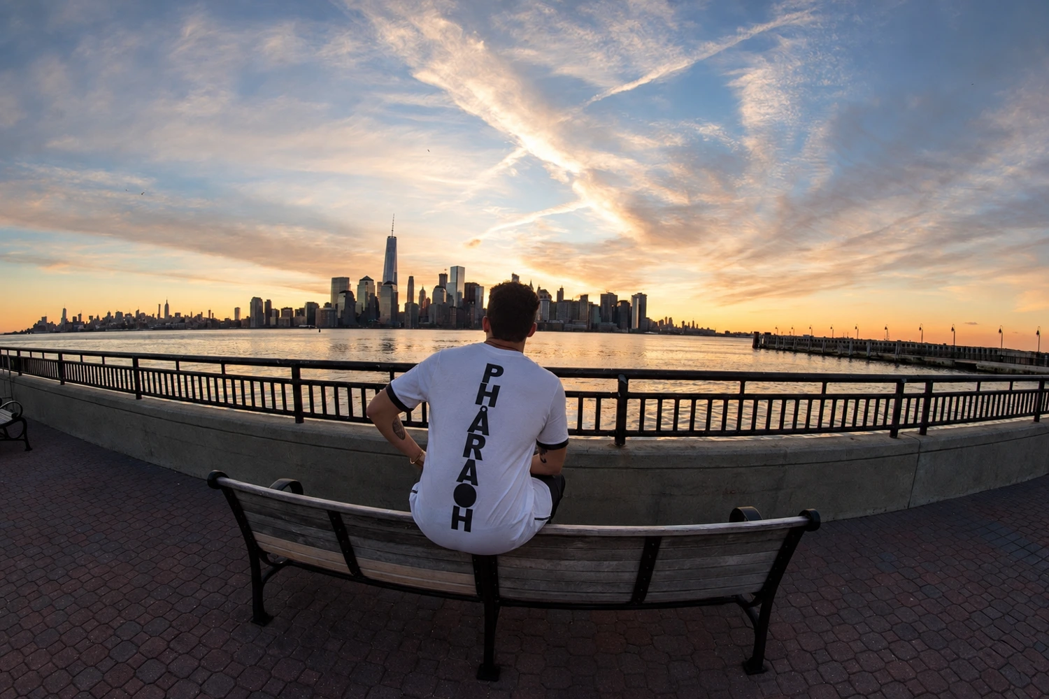 Branded shirt portrait overlooking the city skyline