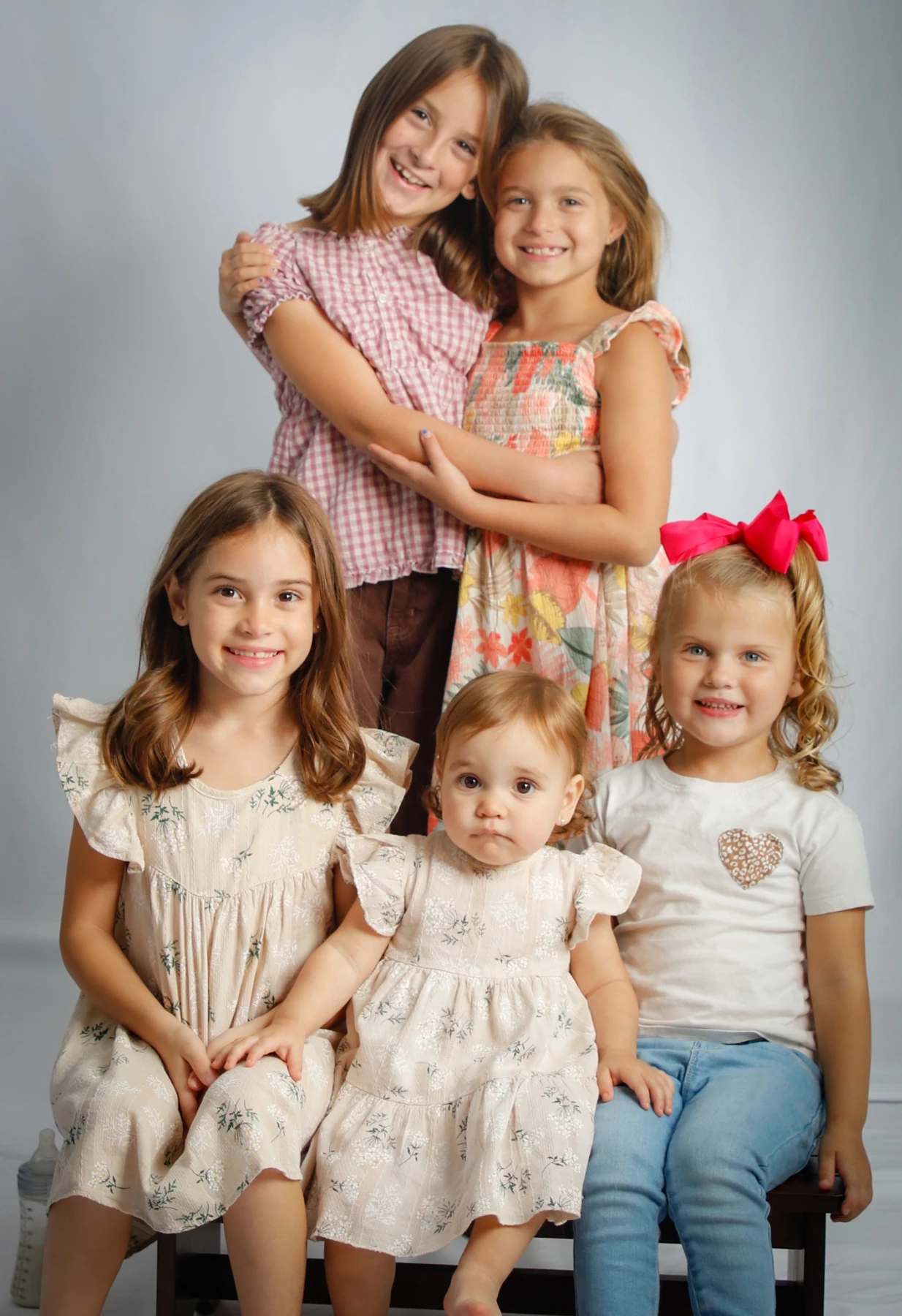 Family posing together in the studio